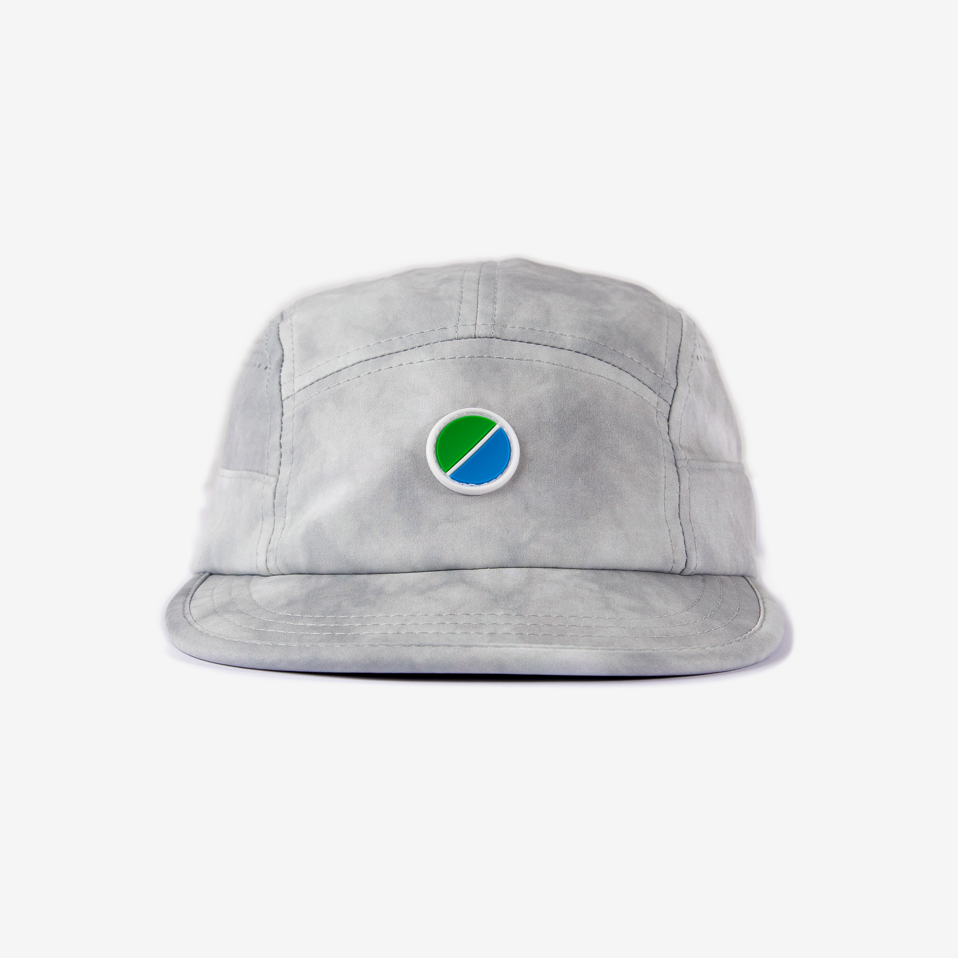 Grey tie-dye V3 Core Cap with adjustable strap and reflective details for lightweight performance and ventilation.