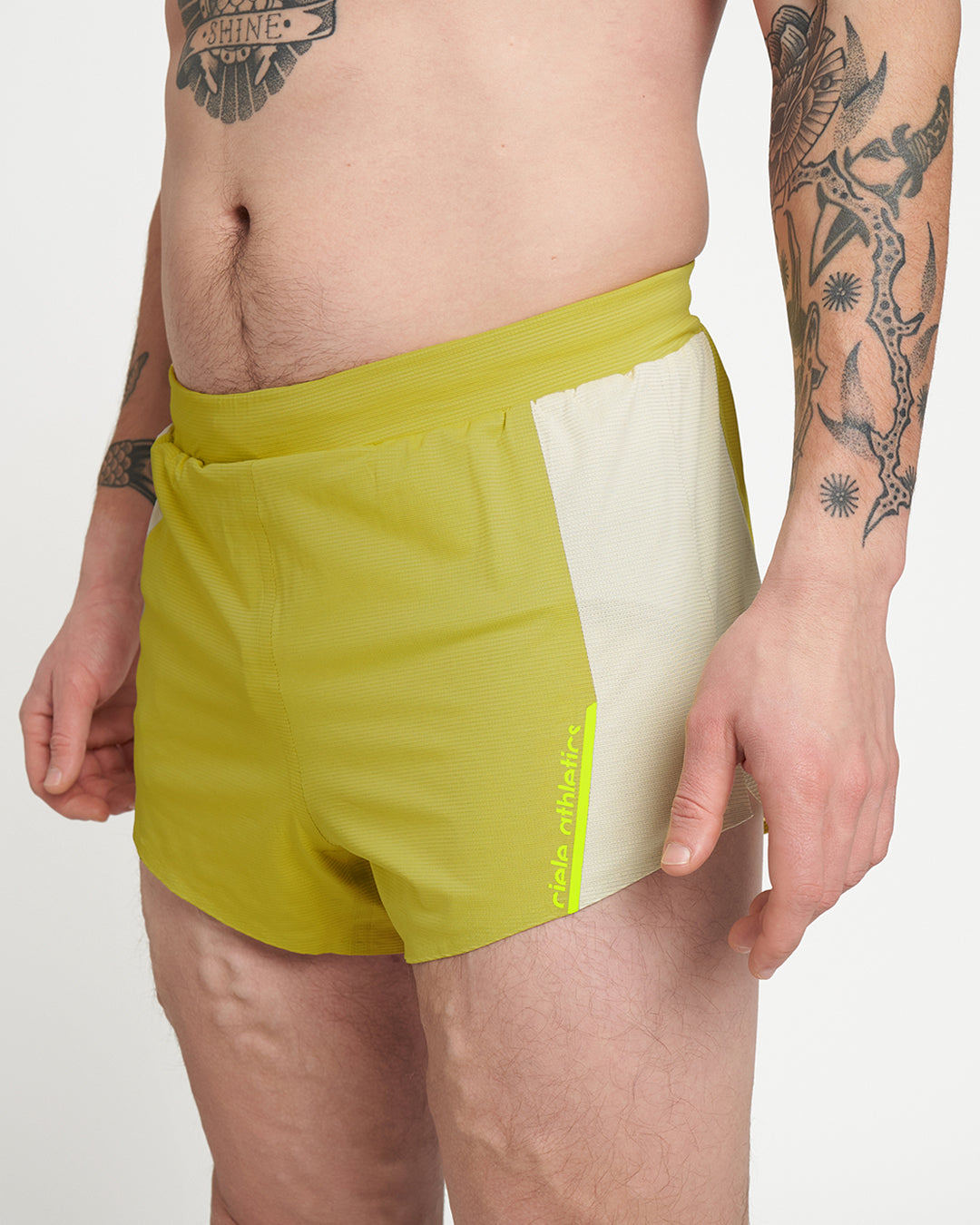 Reflective, machine washable - Elite - Sogl shorts, COOLmatic fabric, green and white design.