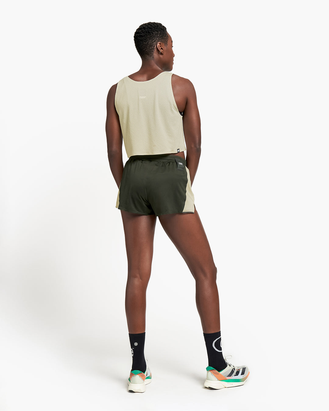 Reflective, wicking Elite Crow shorts with zero-stitch liner, COOLmatic fabric, and inner fuel pockets.