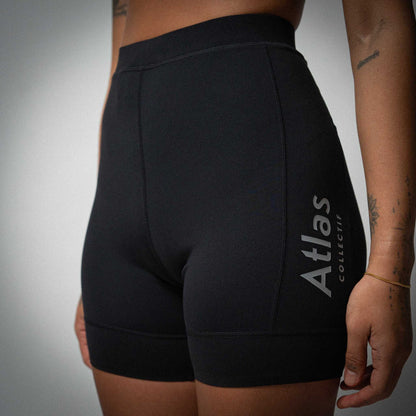 Illumi Trax WMNS Running Half Tights in black with reflective detailing and storage pockets.