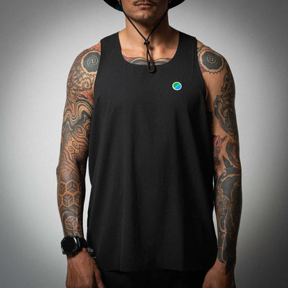 Aeria Fortis Race Tank in black worn by a model, showcasing breathable recycled ripstop fabric with silicone chest patch for runners.