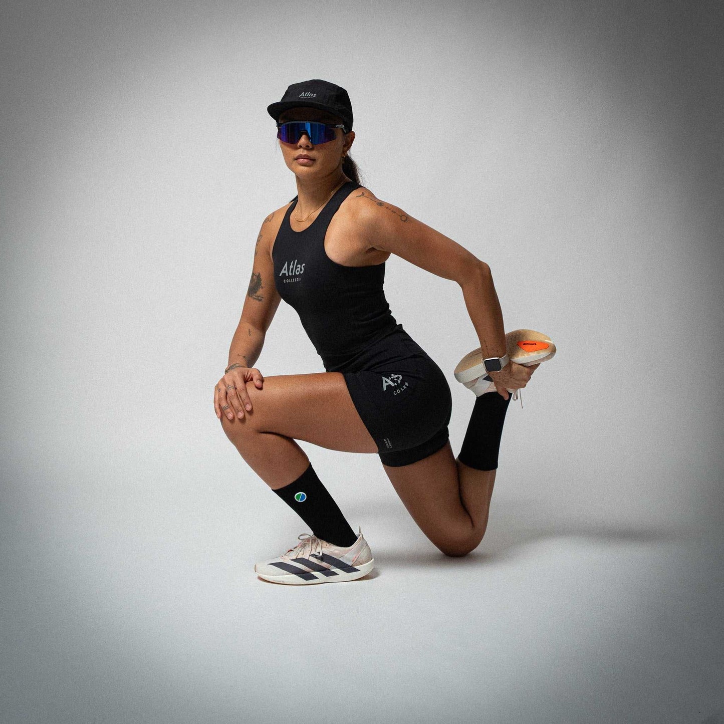 Illumi Trax WMNS Running Crop Tank Black