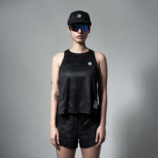 V3 Core WMNS Race Tank Black Tie-Dye, eco-conscious, breathable running singlet with side slits, reflective details, stylish design.