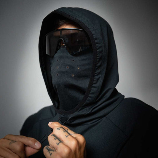 Illumi Trax Running Balaclava Hoodie in black featuring integrated balaclava-style face guard, reflective details, and adjustable hood.